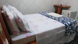 Postel nebo postele na pokoji v ubytování Gold Star Hotel