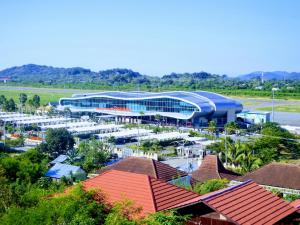 an aerial view of a soccer stadium with buildings at Golo Tango Homestay in Labuan Bajo