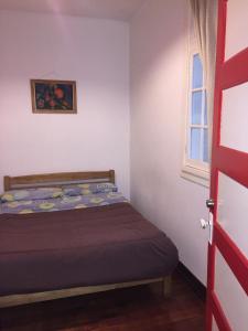 Postel nebo postele na pokoji v ubytování Lemuria Hostel