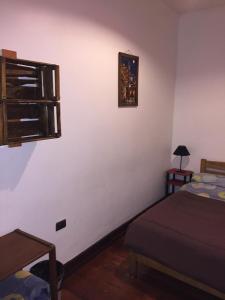 Postel nebo postele na pokoji v ubytování Lemuria Hostel