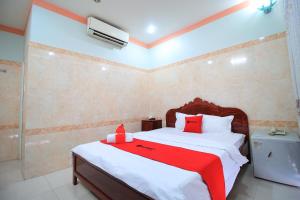 Postel nebo postele na pokoji v ubytování Chin Sao Hotel Nguyen Thi Thap
