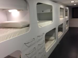 Krevet ili kreveti na sprat u jedinici u okviru objekta Hostel Casa Ibarrola