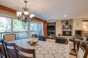 a dining room and living room with a table and chairs at Cedars West in Incline Village
