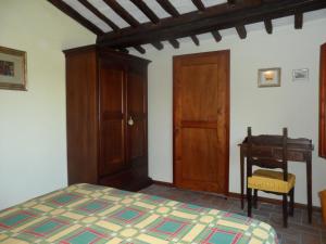 Posteľ alebo postele v izbe v ubytovaní Podere Il Caggio Rooms