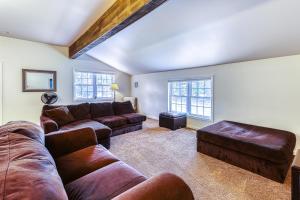 a living room with a couch and a table at Pine's Way Camp in Chestertown