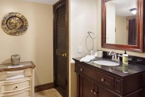 a bathroom with a sink and a mirror at 468 Pequawket Drive in Conway +28 photos
