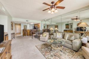 a living room with a couch and a table at Sterling Sands 405 Destin (Condo) in Destin
