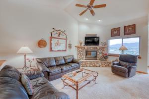 a living room with a couch and a fireplace at Lookout Ridge 63 in Dillon