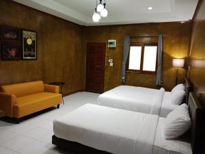 Postel nebo postele na pokoji v ubytování Superkids Resort