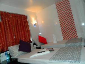 Ένα ή περισσότερα κρεβάτια σε δωμάτιο στο Marrigold Hostel