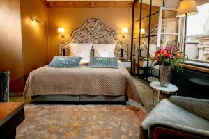 Posteľ alebo postele v izbe v ubytovaní Balthazar Design Hotel