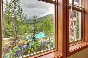 a window with a view of a mountain view at Eagle Springs East 201: Horsetail Suite in Burnt Flat