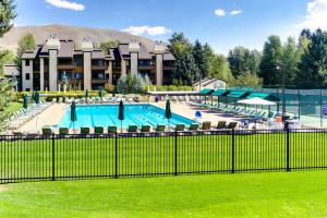 a swimming pool at a resort with a building at New Villager 1294 in Sun Valley