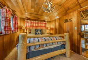 Voodi või voodid majutusasutuse Twin Tree Lodge toas