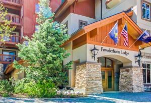 a rendering of the front of a mountain lodge building at Powderhorn Lodge 107: Columbine Suite in Solitude