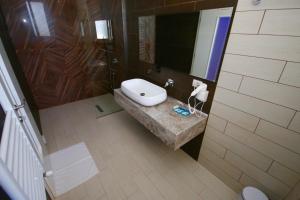 Koupelna v ubytování ELJOS HOTEL + 33 fotografií