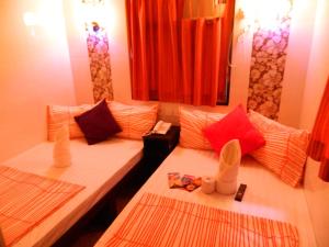 Ένα ή περισσότερα κρεβάτια σε δωμάτιο στο Marrigold Hostel