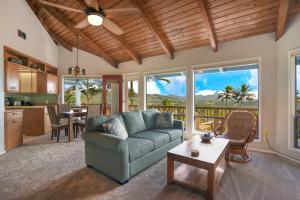 a living room with a couch and a table at Kalaheo View - TVNC 5018 in Kalaheo