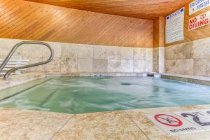 a large swimming pool with a hot tub at Park City Getaway in Park City