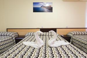 Postel nebo postele na pokoji v ubytování Hostal la Campana
