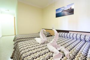 Postel nebo postele na pokoji v ubytování Hostal la Campana