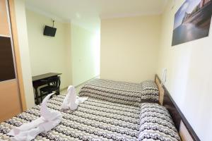 Postel nebo postele na pokoji v ubytování Hostal la Campana