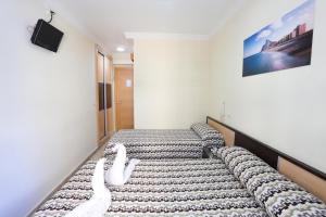Postel nebo postele na pokoji v ubytování Hostal la Campana