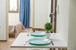 Postel nebo postele na pokoji v ubytování Mokamvilia