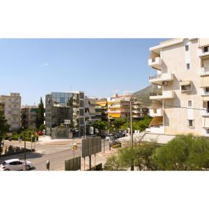 a view of a city with buildings and a street at Loutraki Suites in Loutraki