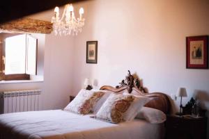 Postel nebo postele na pokoji v ubytování Posada Real del Buen Camino