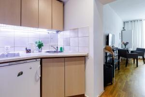 Dapur atau dapur kecil di Apartament Przytulny Centrum 150m od dworca głównego PKP