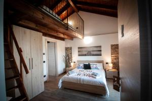 Postel nebo postele na pokoji v ubytování B&B Tenuta Legnate
