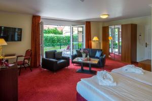 Posezení v ubytování Hotel Hafen Hitzacker - Elbe + 37 fotografií