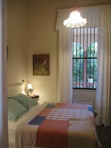 En eller flere senge i et værelse på Casa rural estilo Vintage