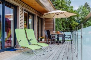 Balkon lub taras w obiekcie Ferienbungalow Mountain View Wood