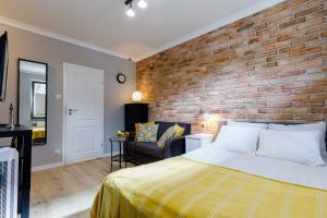 Posteľ alebo postele v izbe v ubytovaní Apartamenty Przytulne z parkingiem rowerowym, dostępem sauny- bicycle parking and access to the Sauna + 37 fotografií