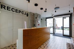 Lobby alebo recepcia v ubytovaní Apartamenty Przytulne z parkingiem rowerowym, dostępem sauny- bicycle parking and access to the Sauna