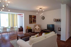TV a/nebo společenská místnost v ubytování Casa Idilica Apartment