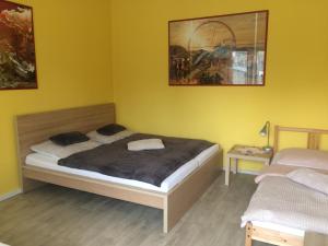 Кровать или кровати в номере Apartment Praha 4