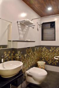 Ένα μπάνιο στο Hotel Grand Ecotel, Aurangabad