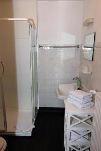 a bathroom with a shower and a sink and a toilet at Gretel von Birne in Winterberg