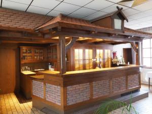 a bar in the middle of a building at Gasthof Erfurth in Sehnde