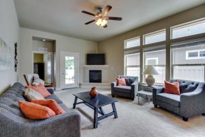 a living room with two couches and a fireplace at Sunglow Townhouse in Boise