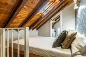 Ένα ή περισσότερα κρεβάτια σε δωμάτιο στο Waou Los Austrias II - Alquiler Corta Duración