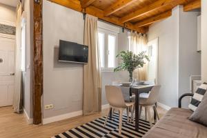 Μια τηλεόραση ή/και κέντρο ψυχαγωγίας στο Waou Los Austrias II - Alquiler Corta Duración