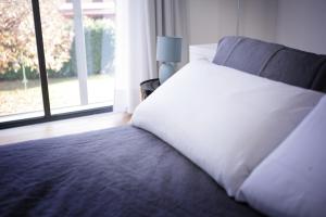 Postel nebo postele na pokoji v ubytování Mxp Rooms Guest House