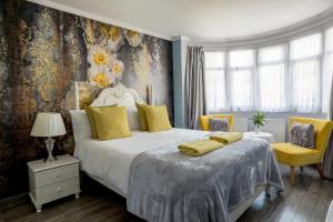 Tempat tidur dalam kamar di Amazing London