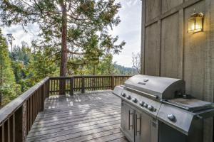 a grill on the deck of a house at Forest Falls in Shaver Lake