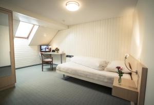 Postel nebo postele na pokoji v ubytování Hotel Kreuz + 23 fotografií