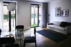A seating area at Mxp Rooms Guest House